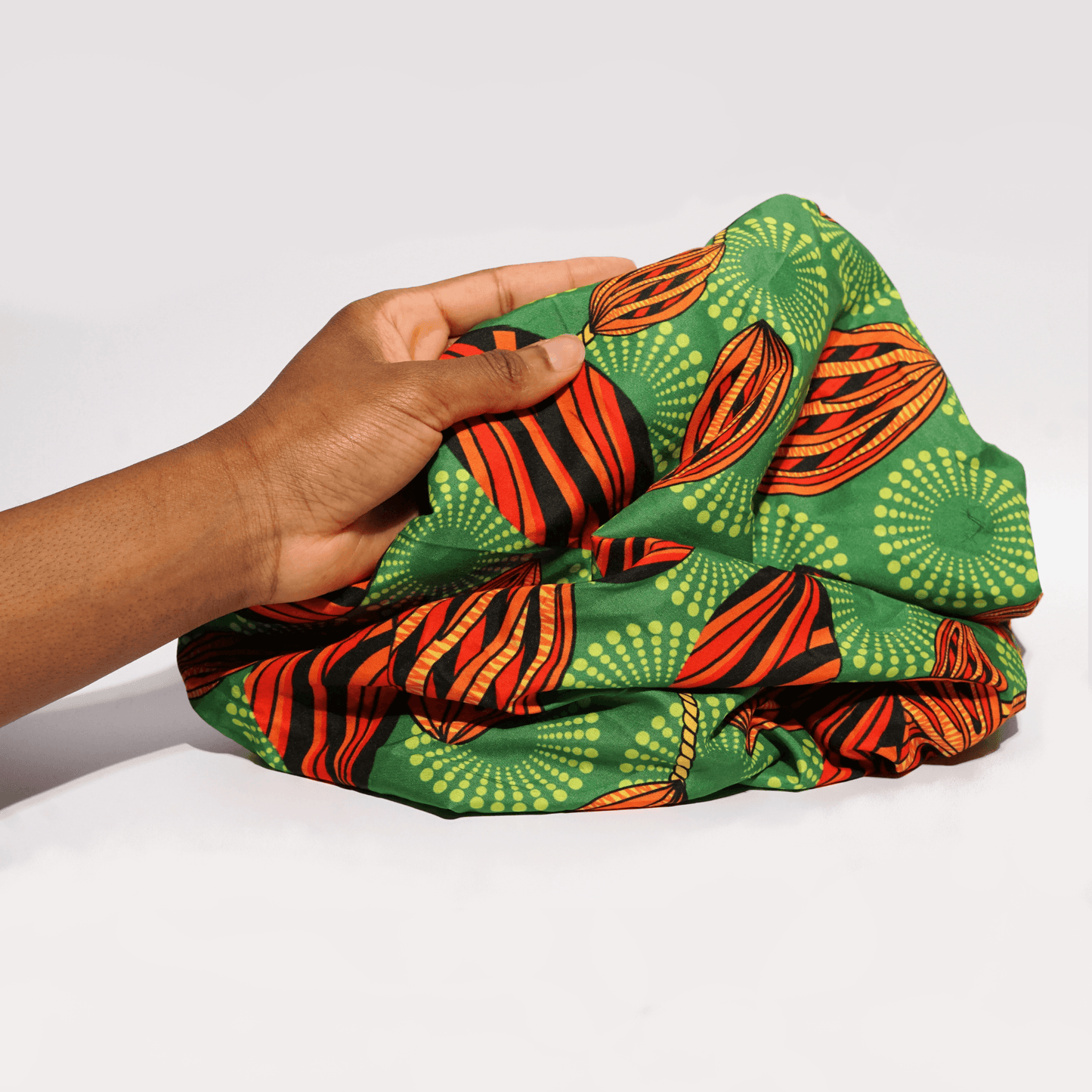 African print satin lined bonnet UK. Green African print satin lined bonnet. Satin hair bonnet. Silk sleep cap.