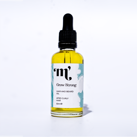 hair growth oil infused with rosemary, peppermint and ayurvedic herbs